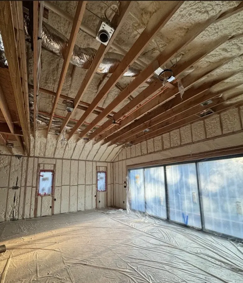 Interior walls and ceiling insulated with spray foam during new construction in Whitehouse